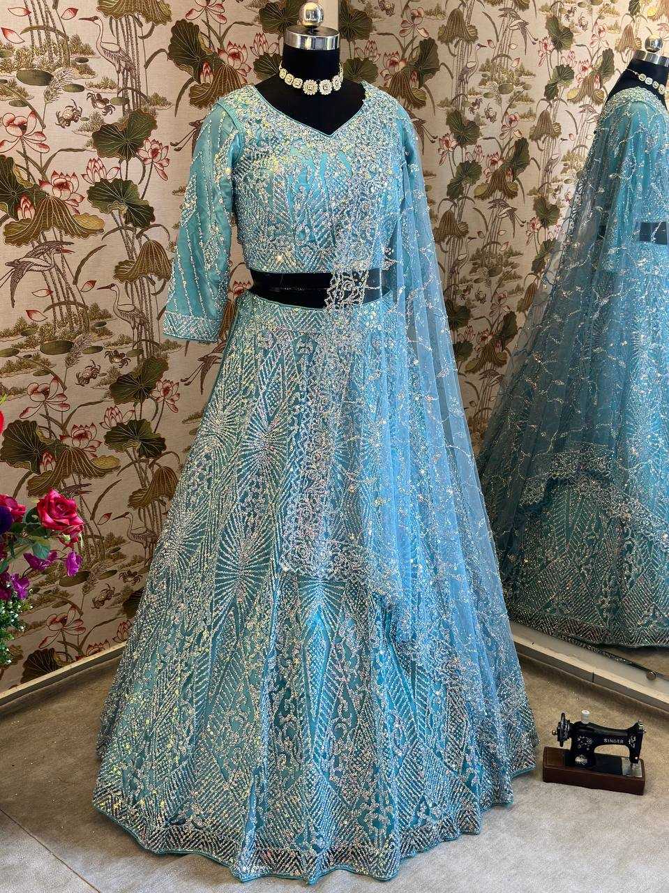 YNF NET RIN114 5027 LEHENGAS WHOLESALE DESIGNER NET FANCY EMBROIDERED BLUE LEHENGAS MANUFACTURER